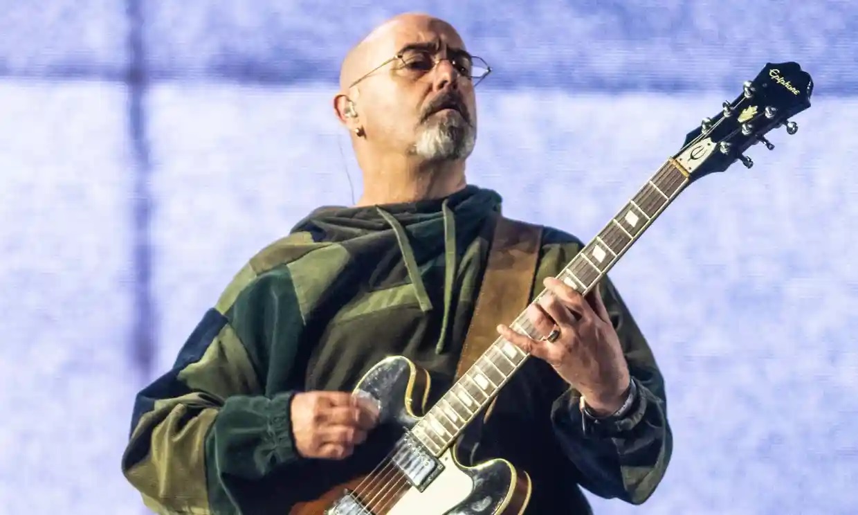 El guitarrista de Oasis, Paul ‘Bonehead’ Arthurs, es diagnosticado con cáncer de amígdalas